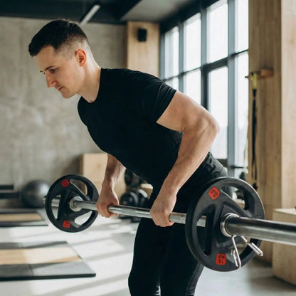 homme tirage barre disque muscultaion